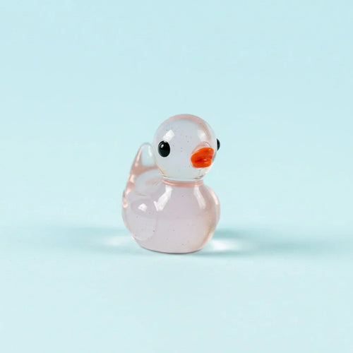 Miniature Glow Duck Assorted (1pc) displayed on a light blue background